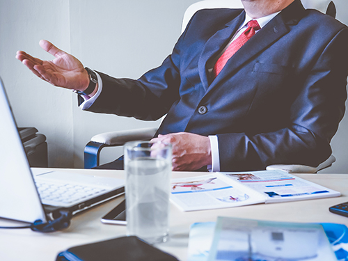 A Kornitzer Capital Management adviser meeting with private clients