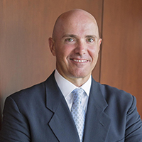 Portrait of Brett Coughlin, Equity & Fixed Income Trader at Kornitzer Capital Management